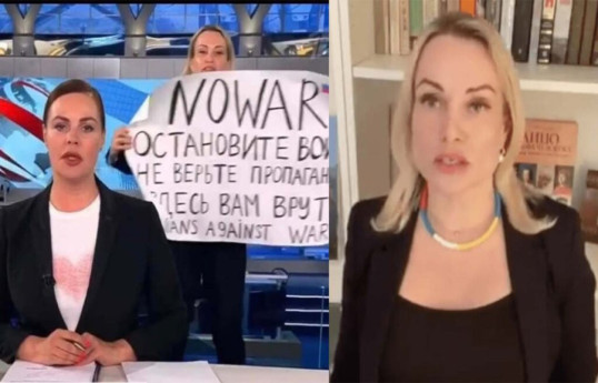 Russia jails state TV protester 8.5 years in absentia