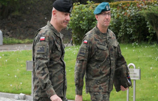 2 top Polish military commanders resign in a spat with the defense minister