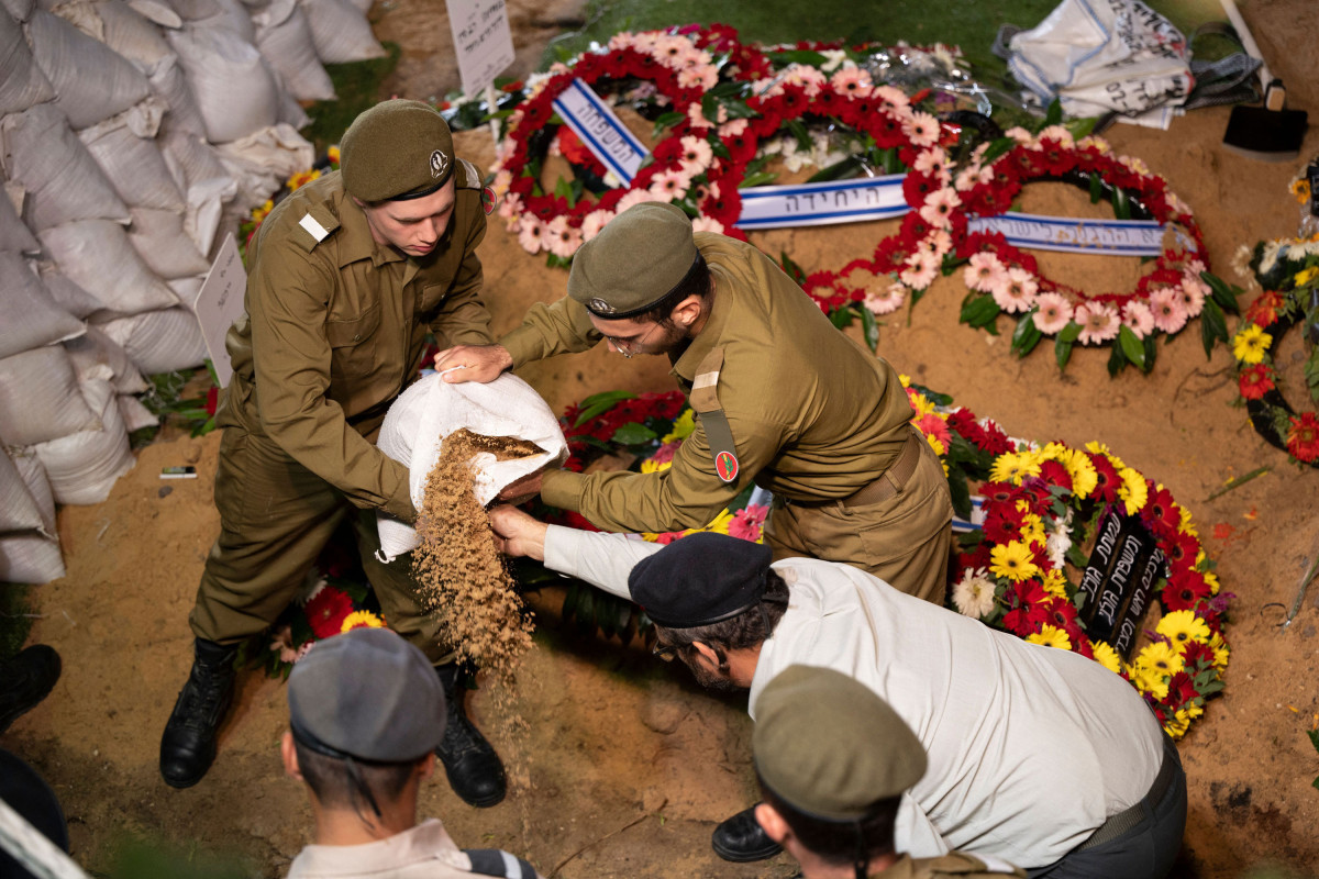 Israeli broadcaster says death toll from Hamas attacks has grown to 1,200 people