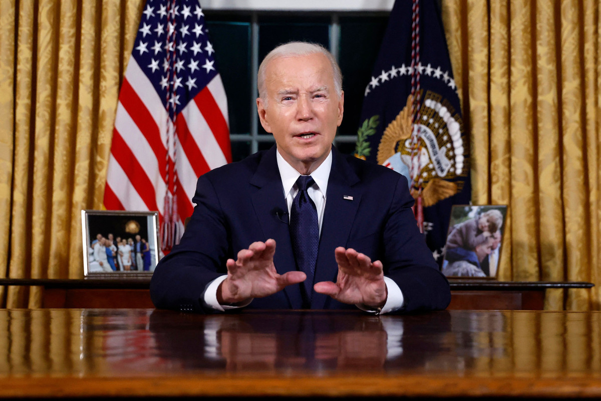 US President Joe Biden addresses the nation on the conflict between Israel and Gaza and the Russian invasion of Ukraine from the Oval Office of the White House in Washington, DC, on October 19. Jonathan Ernst/AFP/Getty Images