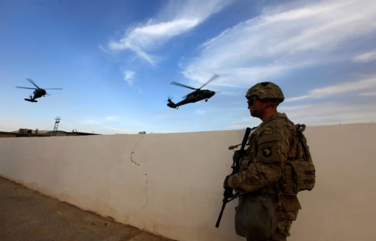 US troops attacked in Iraq, Syria and on alert for more strikes