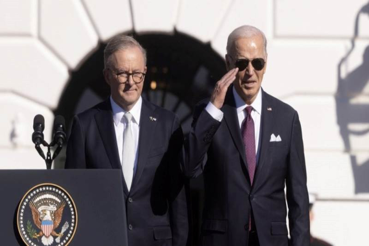 Biden warns Iran of response if attacks on its forces continue