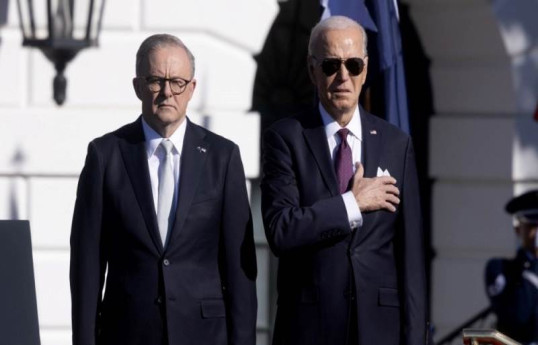 Biden says he told Xi US, Australia aren't surrounding China