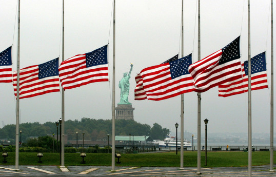 US President orders flags lowered for dead in 'senseless' Maine shooting