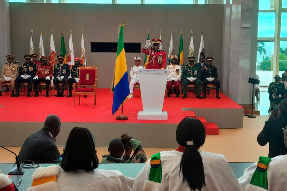 Gabon coup leader sworn in as interim president in scene of jubilation