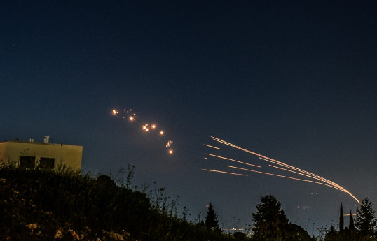 US air defenses intercept some Iranian drones targeting Israel, US officials say
