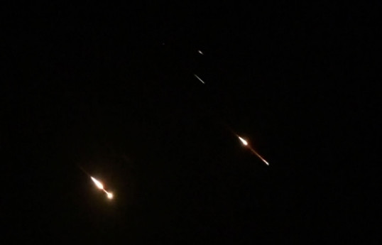 Israeli air defenses intercept some Iranian strikes