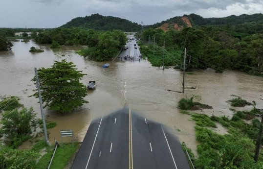 Hurricane Ernesto nears Bermuda, flooding likely