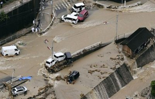 4 missing in central Japan over landslide as typhoon nears