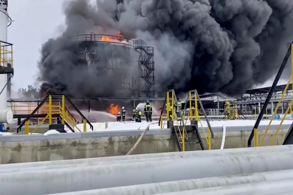 Ukraine says it attacked oil facilities, military depot in Russia
