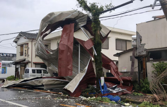 Typhoon hits Japan's Kyushu; three dead, airlines, factories affected