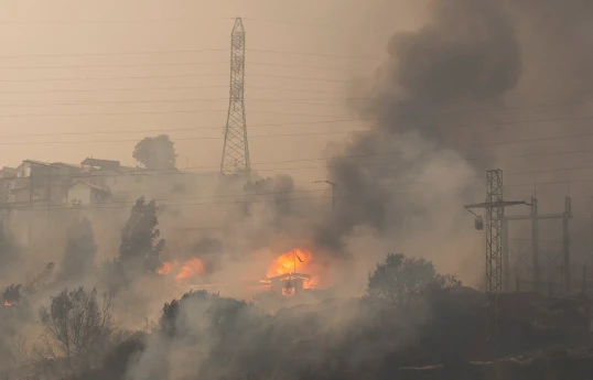 Chile president laments 'tragedy' as wildfires kill 64; toll seen rising