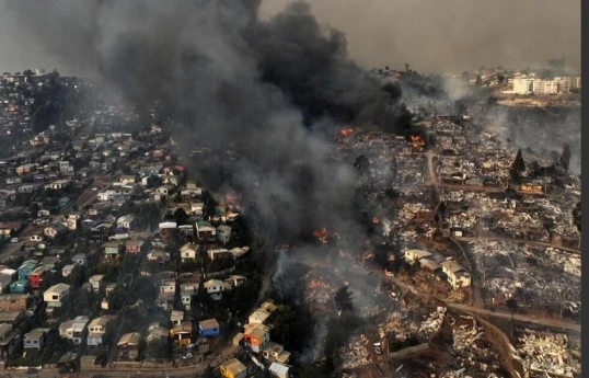 Chile firefighters pull bodies from rubble as blaze death toll climbs-UPDATED 