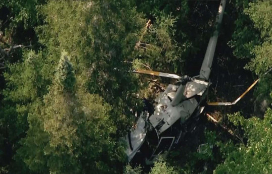 No survivors found after helicopter crashes with six aboard, officials say