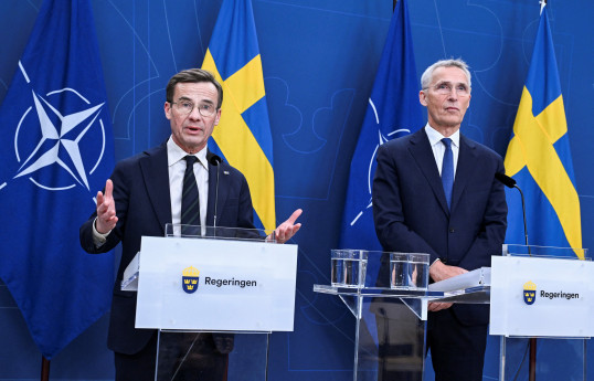 Swedish Prime Minister Ulf Kristersson and NATO Secretary General Jens Stoltenberg