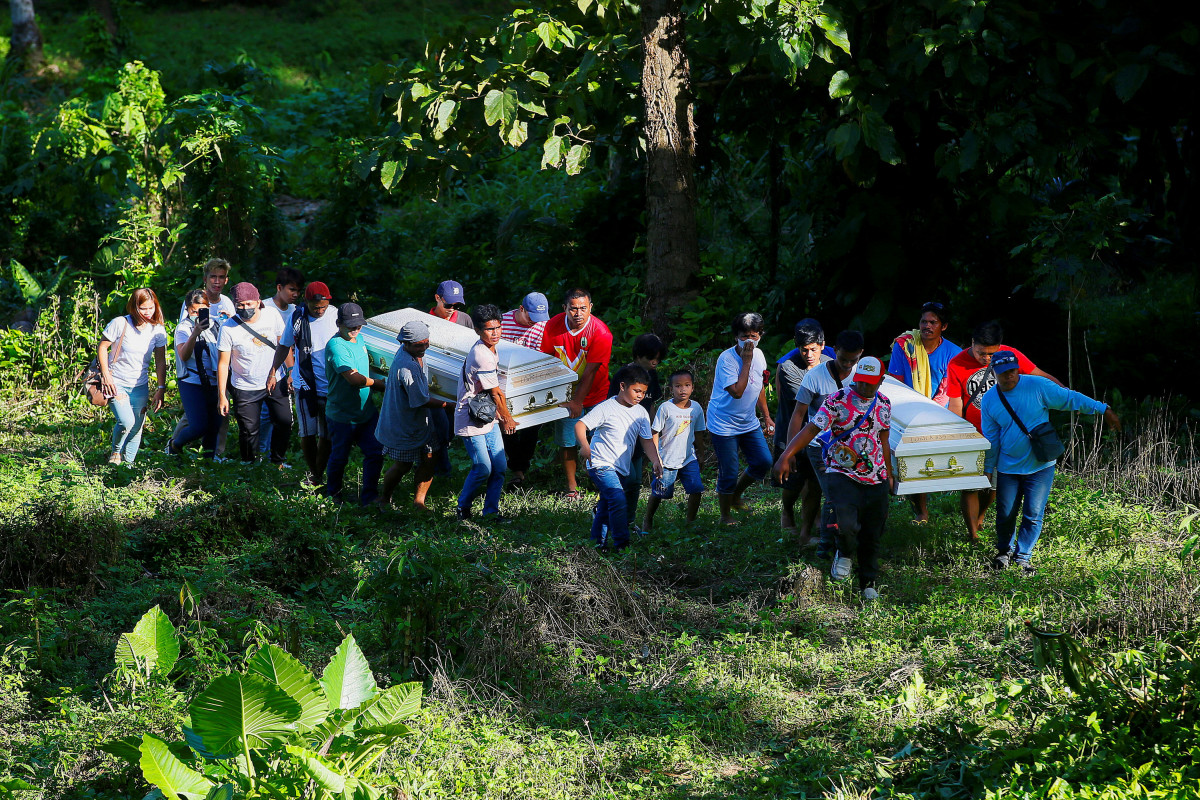 Philippine landslide death toll rises to 92, search for 36 continues