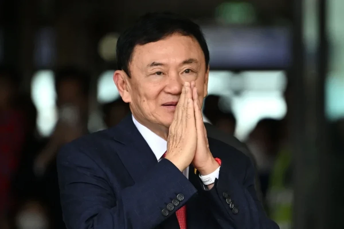 Thaksin Shinawatra,  former Thai Premier