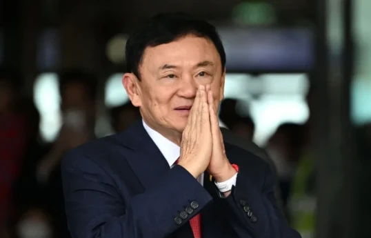 Thaksin Shinawatra,  former Thai Premier