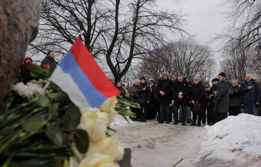 More than 400 detained in Russia at events in memory of Navalny, rights group says