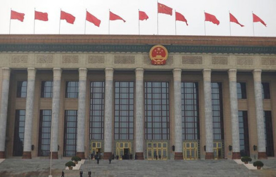 China broadens law on state secrets to include 'work secrets'