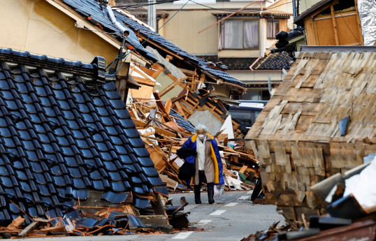 U.S. readies aid as Japan earthquake death toll nears 100