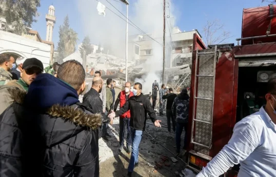 Iran warns air strike on Syria will not go unanswered