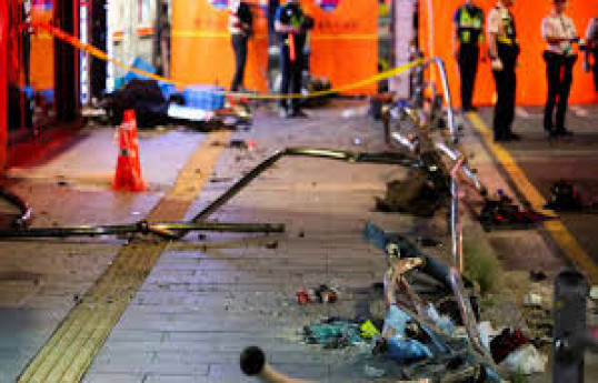 Car drives into crowd near Seoul city hall, nine dead