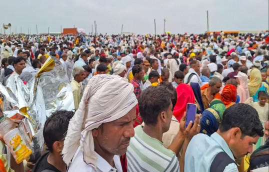 Stampede at religious event in India kills more than 100, mostly women and children