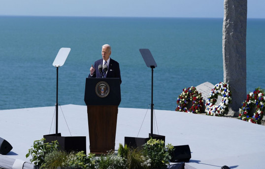 Biden urges Americans to act together, preserve democracy