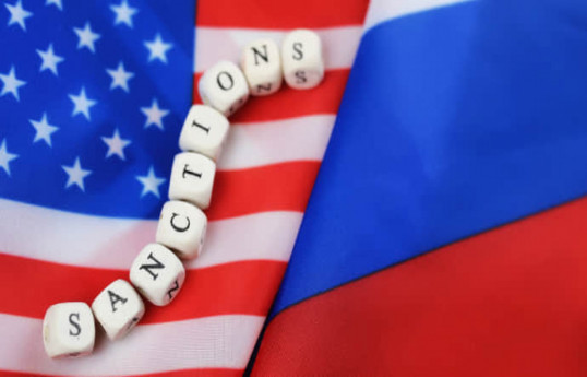 US widens sanctions on Russia to discourage countries such as China from doing business with Moscow