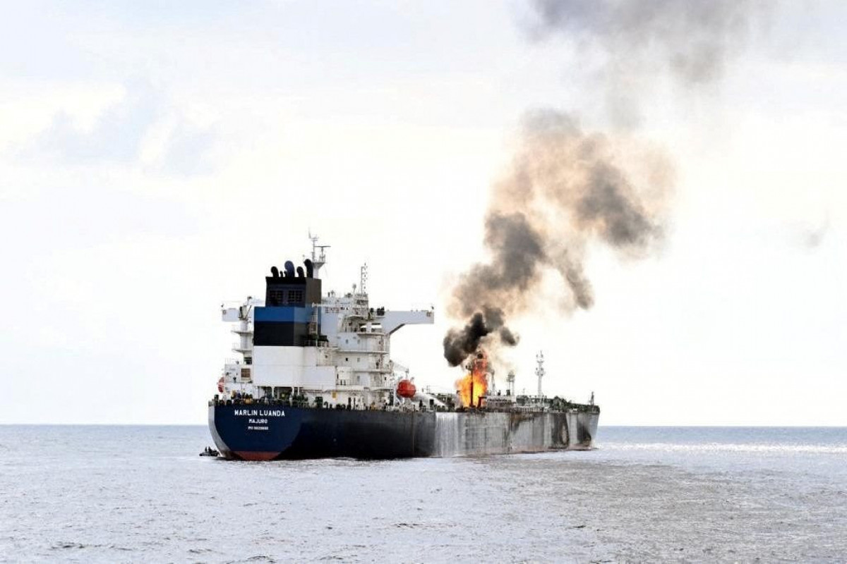 Houthi missile strikes set ship ablaze, injure one crew, US military says