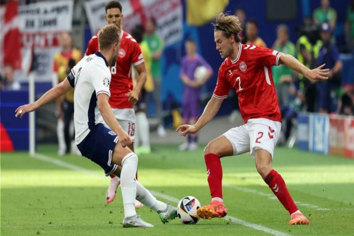 Denmark holds England off to 1-1 draw