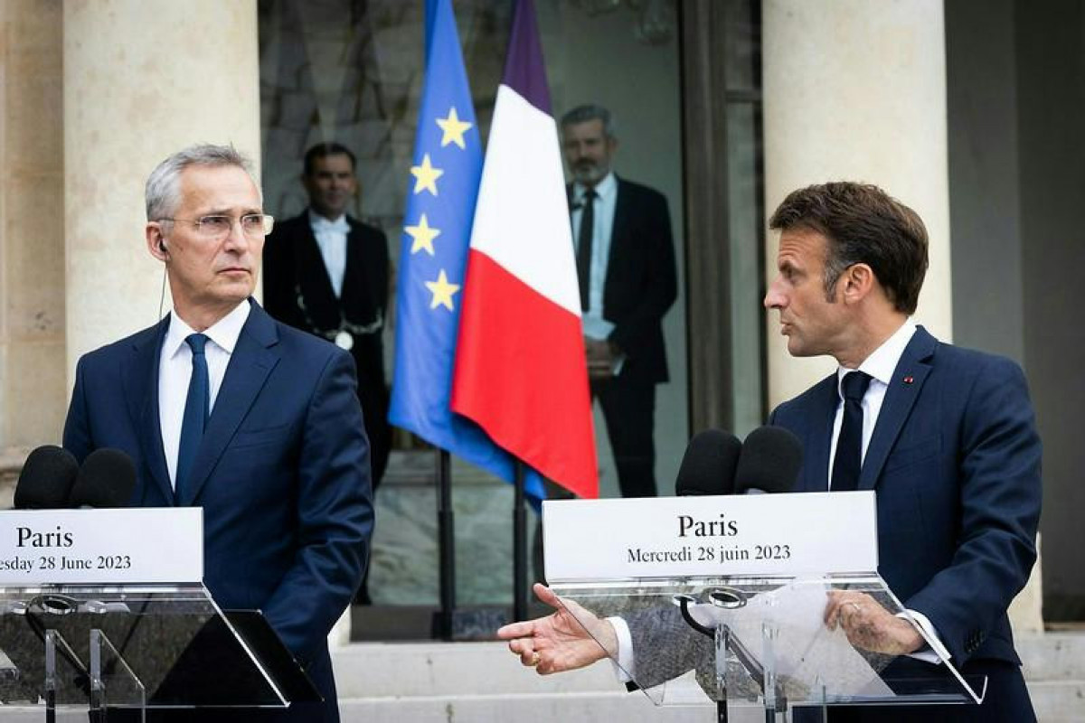 Jens Stoltenberg, NATO Secretary-General and Emmanuel Macron, President of France