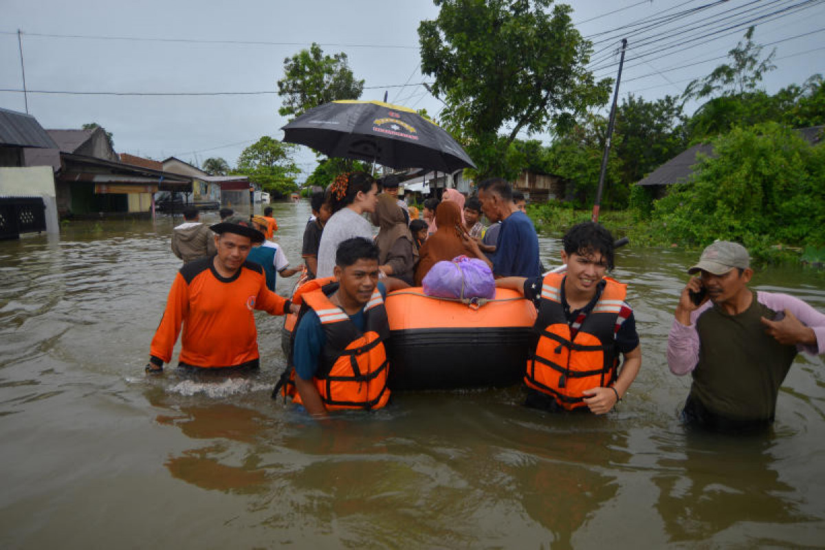 Floods, landslides kill 26 in Indonesia, at least six missing