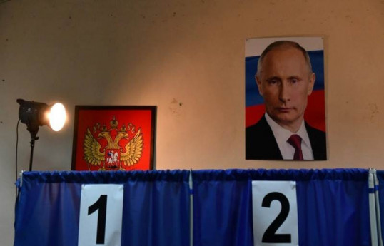 Putin wins 87% of vote for fifth term, exit poll shows