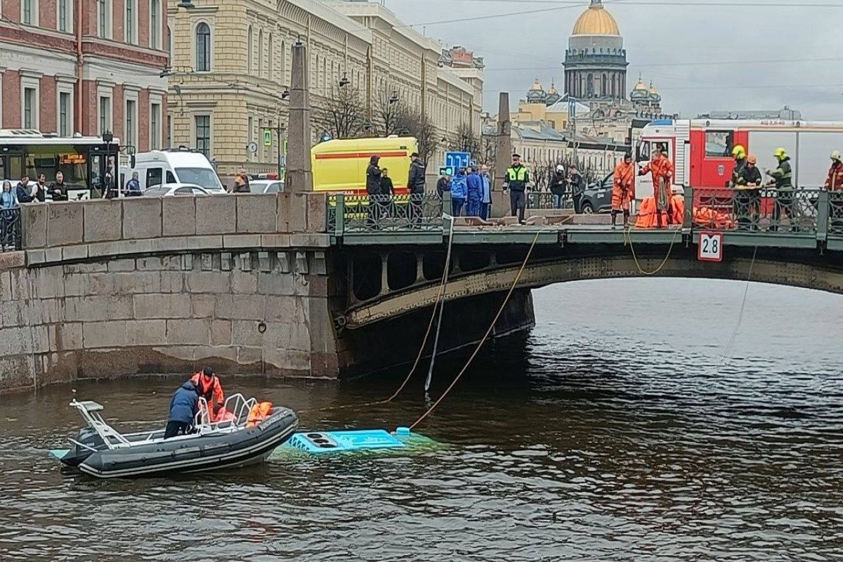 Bus falls into river in Russia