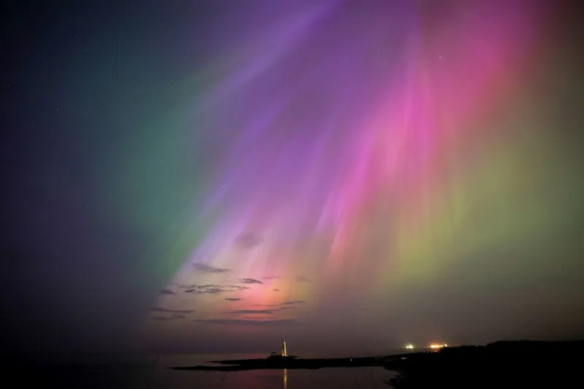 Solar storm hits Earth, producing colorful light shows across Northern Hemisphere