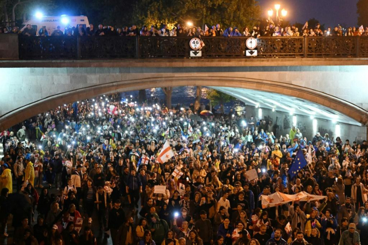 Thousands of Georgians join night-time protest despite warnings