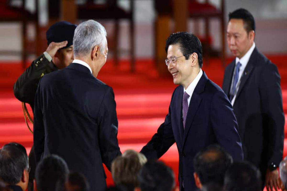 Singapore swears in its first new PM in 2 decades