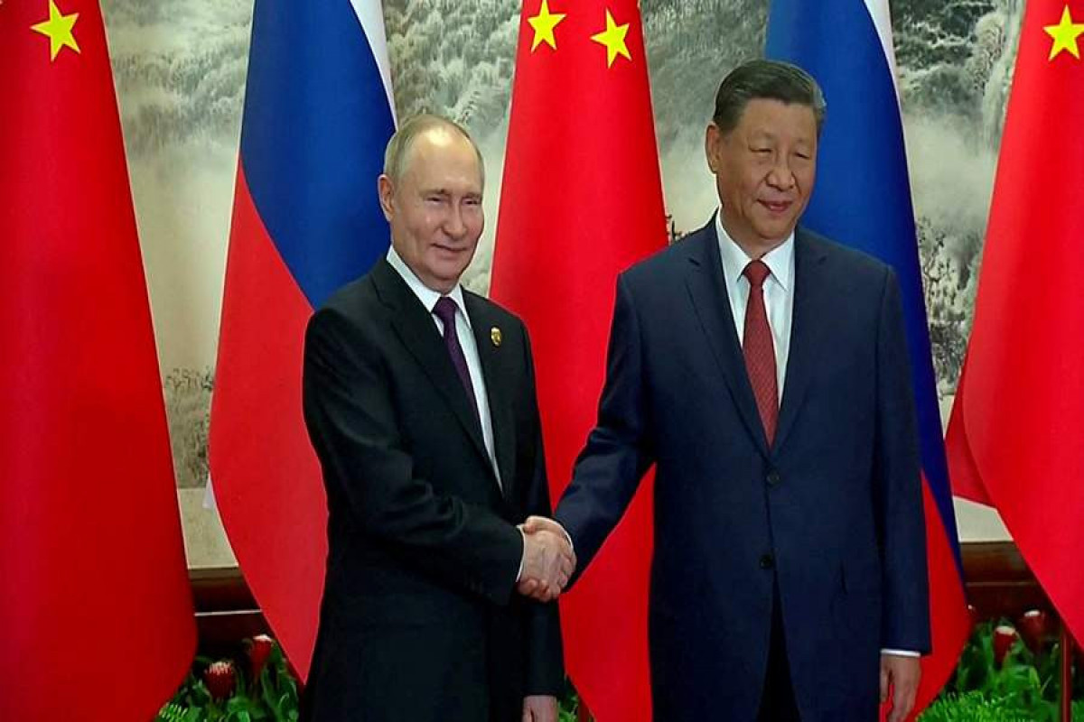 Xi Jinping meets Russia’s Vladimir Putin on state visit to China
