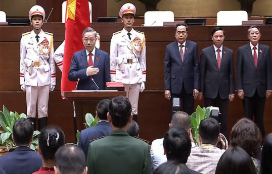 Vietnam appoints top policeman as country's new president