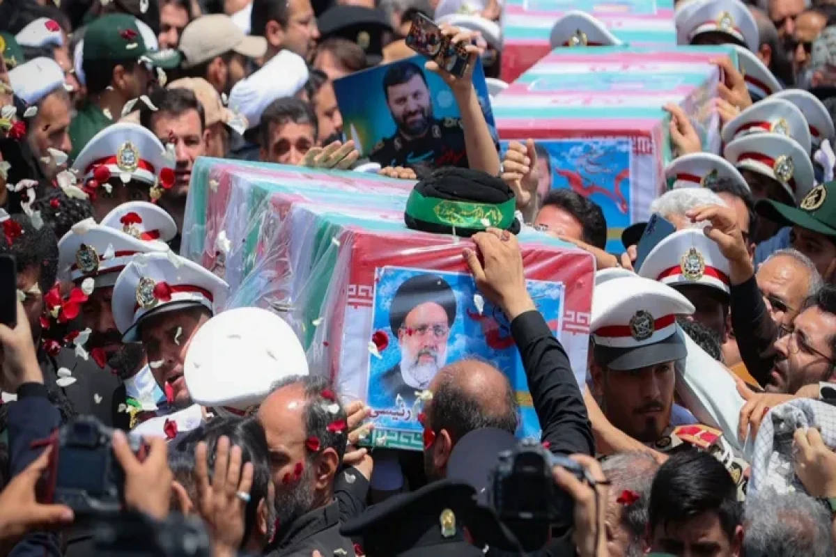 Iran burying late president at shrine in home city of Mashhad