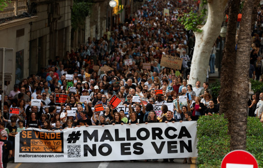 Thousands protest against mass tourism in Spain's Balearic Islands
