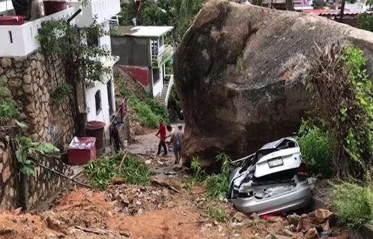 At least 22 reported dead as storm John dissipates over Mexico