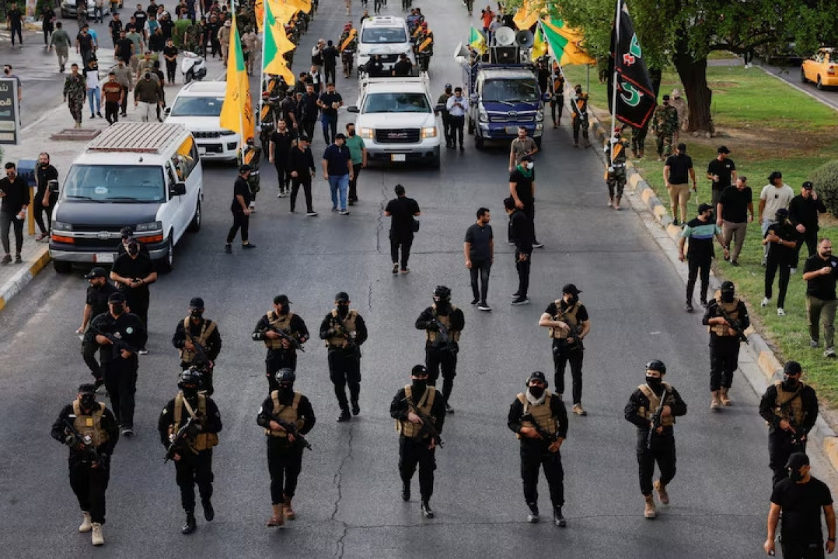 Media: Iran-backed militias in Iraq ready to disarm to avert Trump wrath