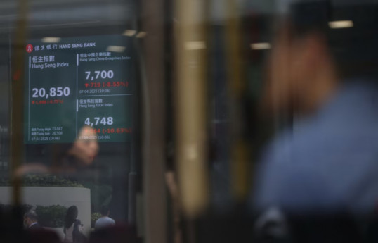 Stocks plunge in Asia, markets bay for rapid US rate cuts