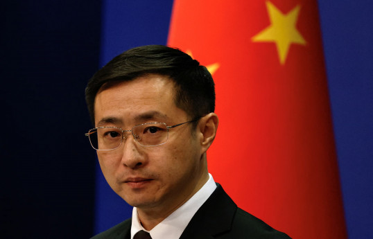 China calls US tariffs 'bullying', urged others to continue with consultation