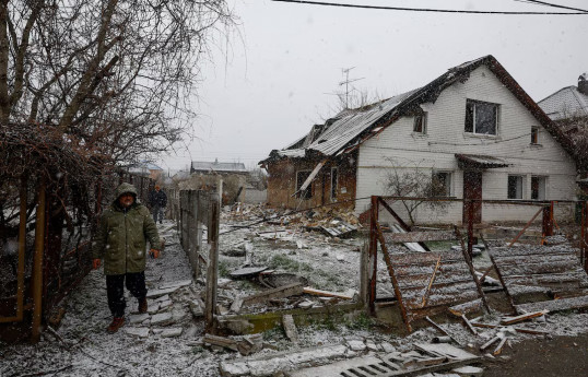 Russian drone attack injures 12 in two Ukrainian cities, officials say