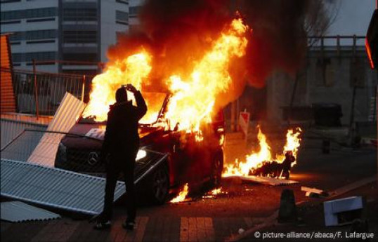 Cars set on fire at French prison after wave of attacks, minister says