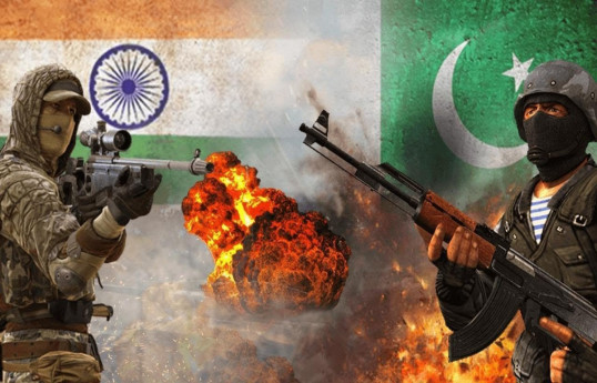 Indian and Pakistani servicemen trade gunfire